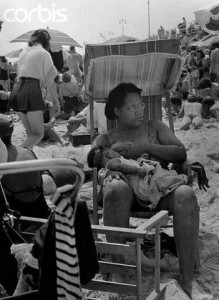 A Mother Feeding Her Baby at the Beach - 1930s